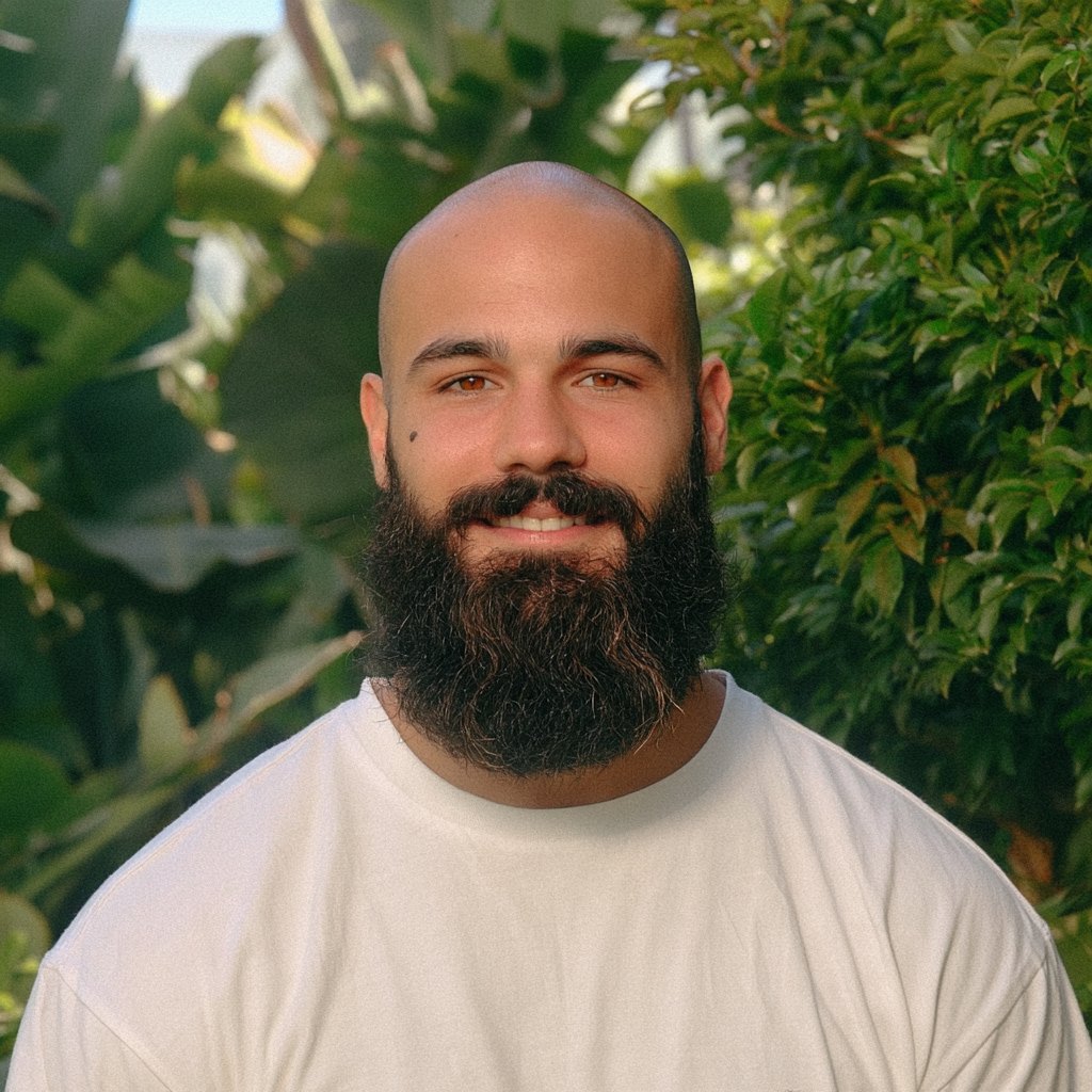 Adur smiling in front of tropical greenery in Bali